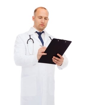 medicine, profession, and healthcare concept - serious male doctor with clipboard and stethoscope writing prescription over white background
