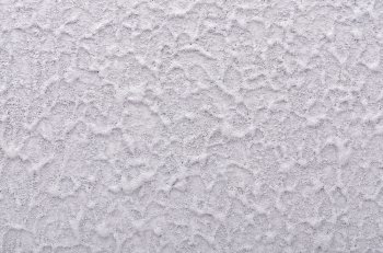 Grey roughcast wall plaster texture