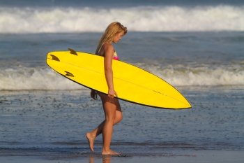 Picture of surfer girl.Bali. Indonesia.