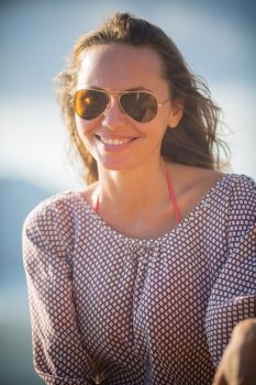 Young Pretty Girl Wearing Sunglasses Smiling