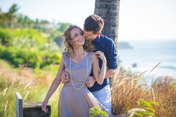 Young Happy Wedding Couple at Sunny Day