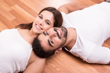 Love Couple at home relaxing on the floor