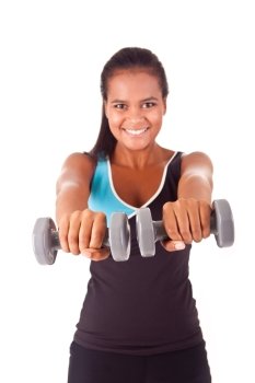 Beautiful african fitness woman working out with free weights