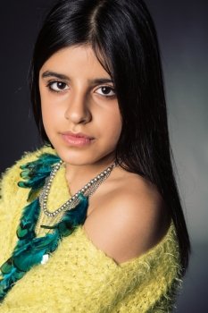 Portrait of a beautiful brunette girl posing