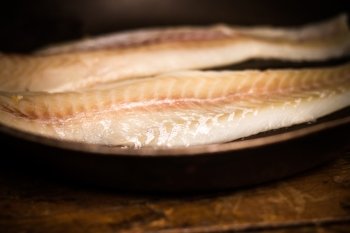 Fish in frying pan