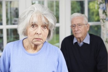 Unhappy Senior Couple At Home Together