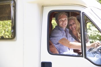 Couple Driving Motor Home On Vacation