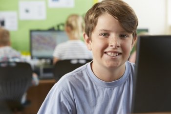Male Elementary School Pupil In Computer Class