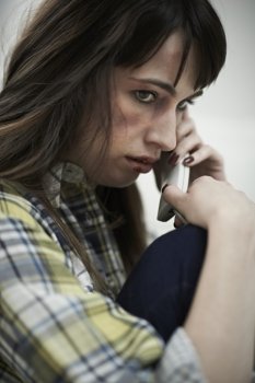 Female Victim Of Domestic Abuse Phoning Support Group