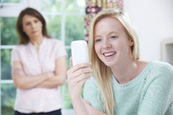 Mother Concerned About Teen Daughter’s Use Of Mobile Phone