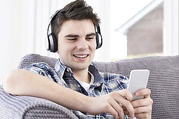 Man Streams Music From Mobile Phone To Wireless Headphones