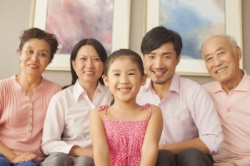 Multigenerational family smiling, portrait