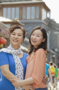 Portrait of mother and daughter on the street in Beijing