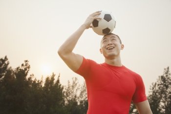 Athletic Man with Soccer Ball