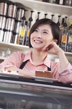 Portrait of barista in coffee shop