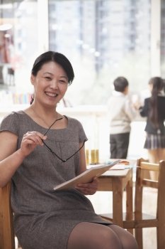 Portrait of smiling teacher in the classroom, Beijing  