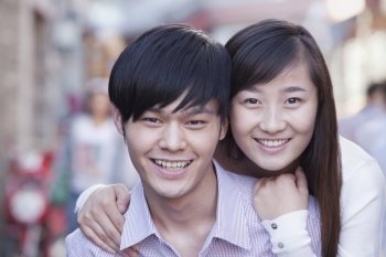 Portrait of Young Heterosexual Couple Smiling in Beijing