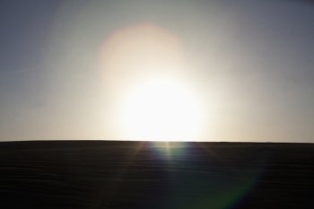 Sun coming down over a sand dune, no people, landscape, lens flare