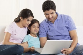 Family using laptop 