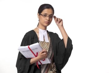Portrait of female lawyer holding documents isolated over white background 