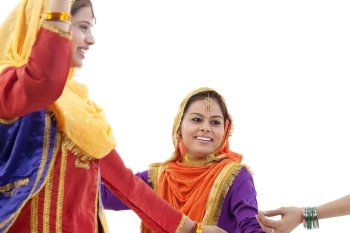 Sikh women dancing 
