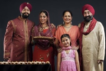 Portrait of a Sikh family with diyas 