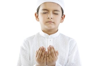 Muslim boy praying 