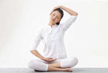 Young woman practicing yoga 