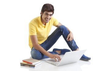 Portrait of a young man with a laptop