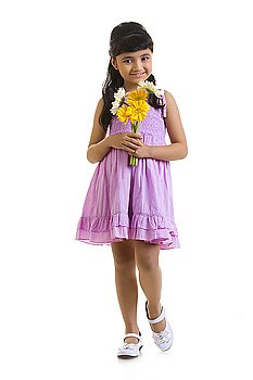 Girl holding flowers