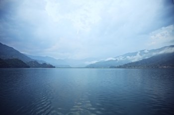 Morning landscape with lake and mountains. Pokhara, Nepal