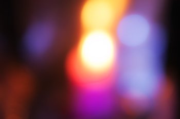 Abstract background with multicolored spots close up