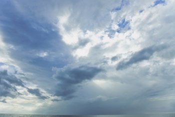 Tropical seascape. Sky with cumulus clouds and water
