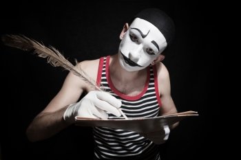 
Portrait of  mime with  quill on black background