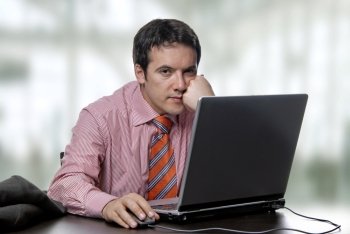 young man working with his personal computer