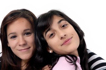two young casual girls portrait in studio