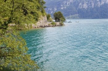 swiss lake near interlaken with boats