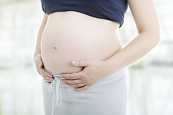 Closeup of pregnant young woman
