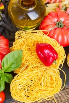 Tonarelli  raw pasta with  pepper, tomato and olive oil