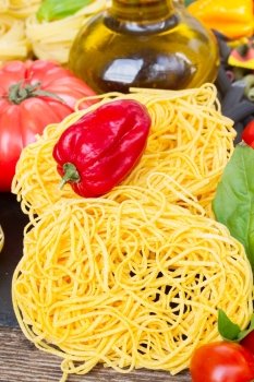 Tonarelli raw pasta. Tonarelli  raw pasta with  pepper and fresh basilic
