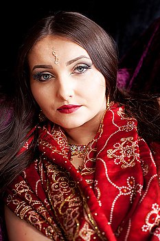 Portrait of a beautiful Indian woman with blue eyes