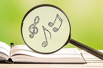 Music search with notes in a magnifying glass