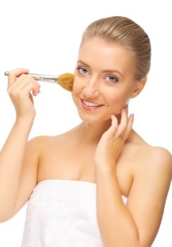 Young smiling girl with makeup brush isolated