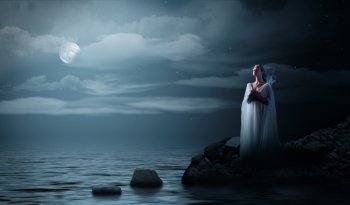 Elven girl on sea coast at night