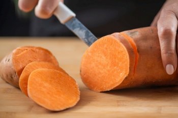 Sweet potatoes, a superfood rich in tryptophan, potassium, vitamin C, phytonutrients, and dietary fibers