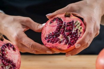 Vibrant allure of pomegranate, a superfood packed with vitamin C, Vitamin K, potassium, folic acid, dietary fibers, and flavonoids.
