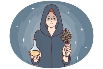 Woman sorceress dressed in cloak with hood holds miraculous elixir and sprig of plant. Healer girl prepared for mysterious rite using magic or healing conspiracy. Woman sorceress dressed in cloak with hood holds miraculous elixir and sprig of plant