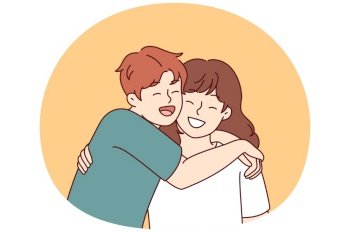 Positive little boy and girl hugging and laughing enjoying spending time together or summer vacation. Concept of happy childhood and friendship between classmates or little brother and sister. Positive little boy and girl hugging and laughing enjoying spending time together