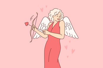 Cupid woman dressed up with wings for valentine day, uses with arrow and bow to seduce boyfriend. Cupid girl in evening dress smiles and looks around in search of groom for romantic relationship. Cupid woman dressed up with wings for valentine day, uses with arrow and bow to seduce boyfriend