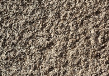 A natural granite stone texture background.